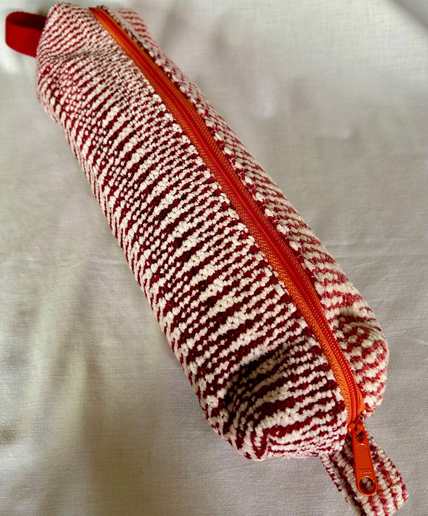 Long zippered pouch for spinning spindles