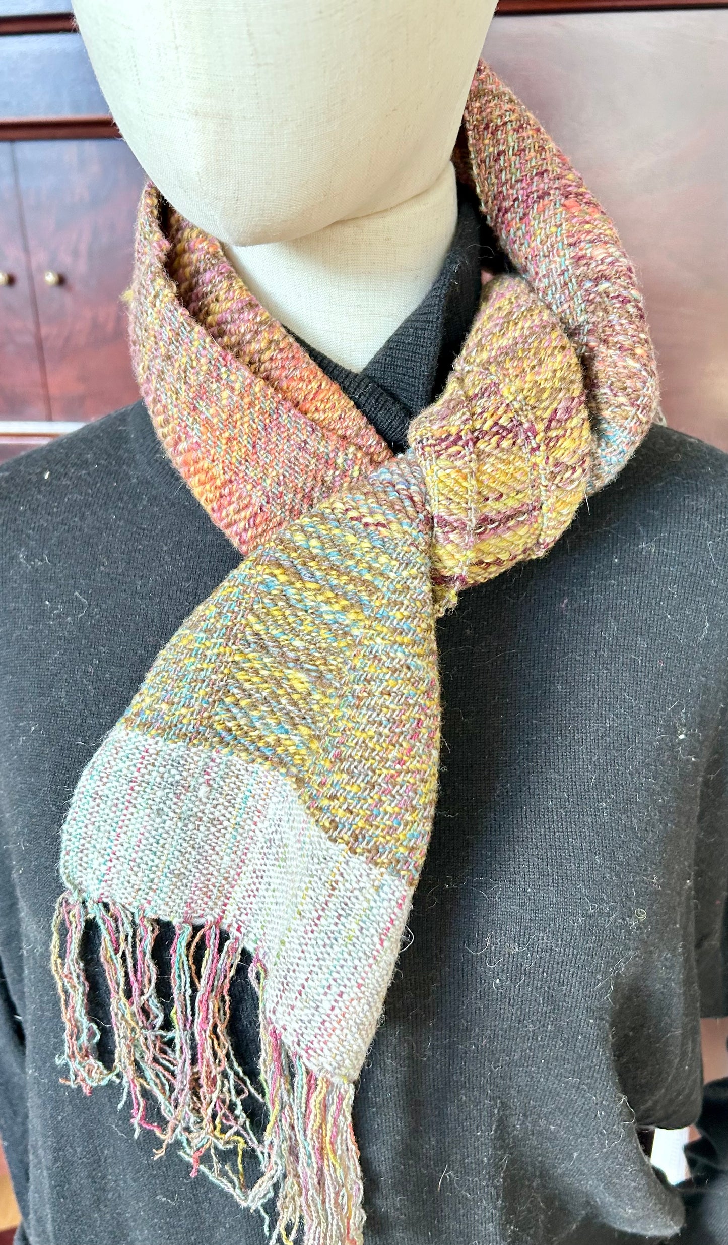 Handwoven scarf with clasp