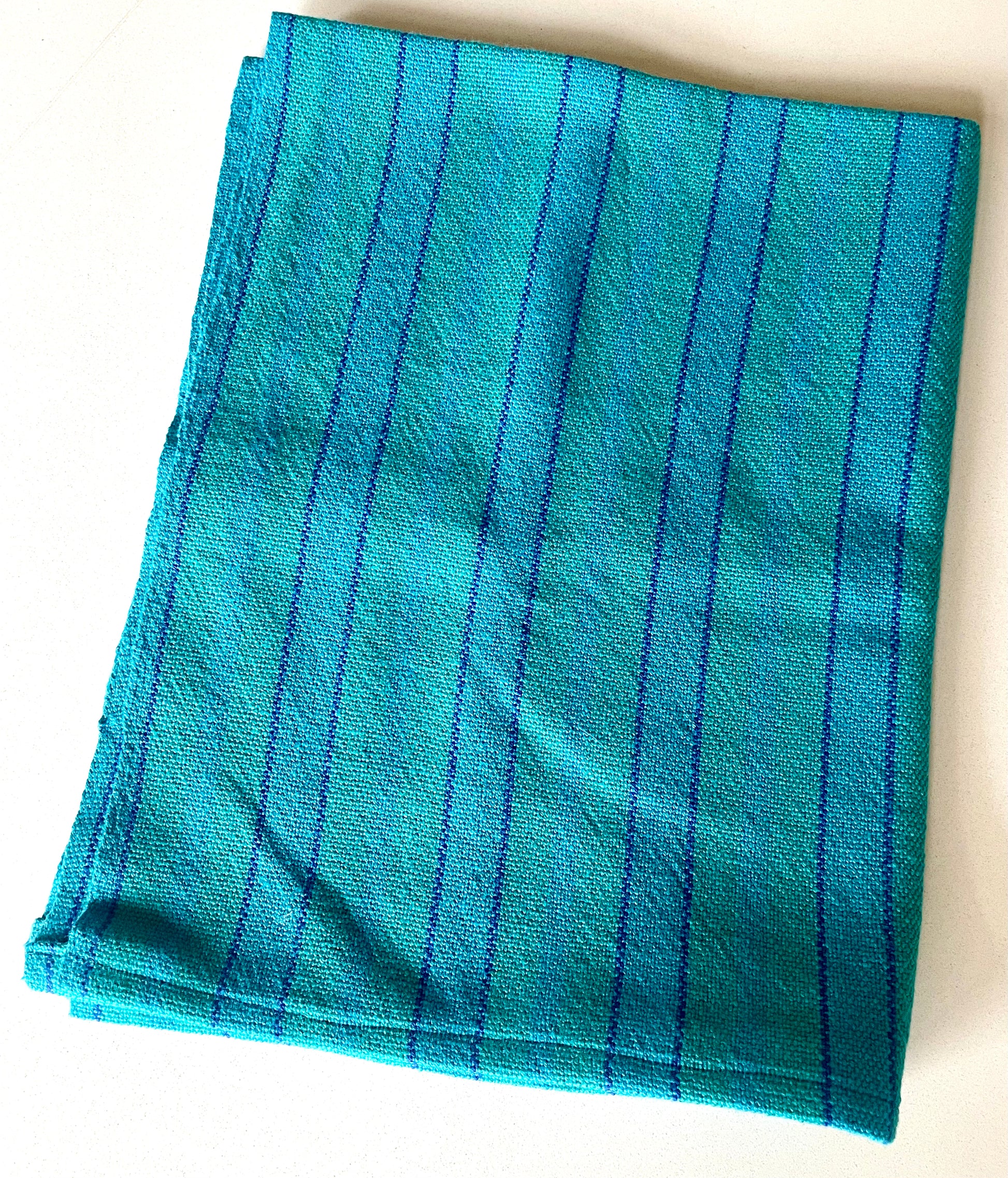 teal and blue towel